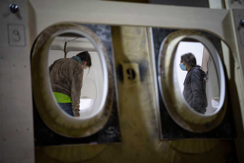 View of the set being installed through the portholes